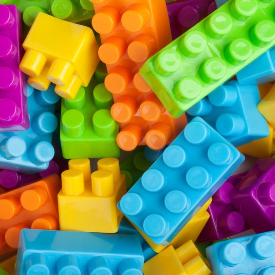 This is an overhead photo of colorful building blocks. These are generic building blocks. They are not legos.